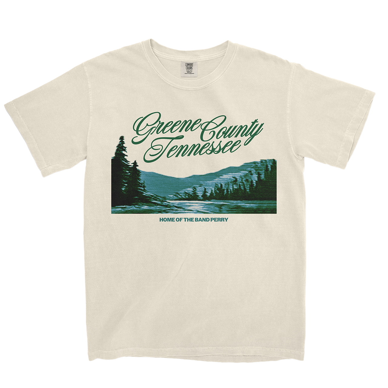 A white t-shirt with 'GREENE COUNTY TENNESSEE' and 'HOME OF THE BAND PERRY' printed in green.